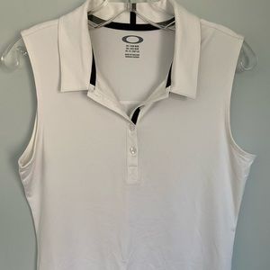 Oakley women’s white golf shirt size M